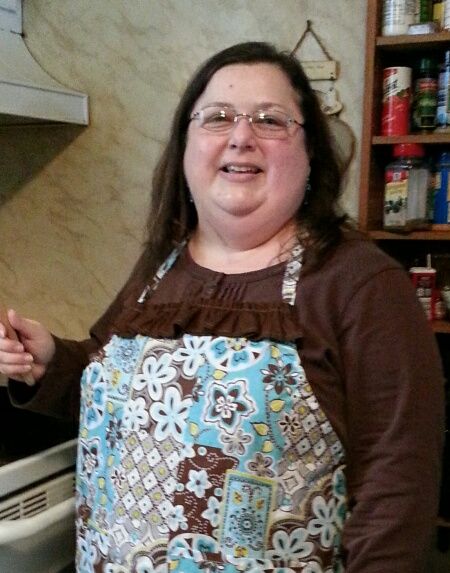 Me in my new apron photo 20140204_152352_zpsc3tynwn_edit_1391739934529_zpsqfjogqlo.jpg